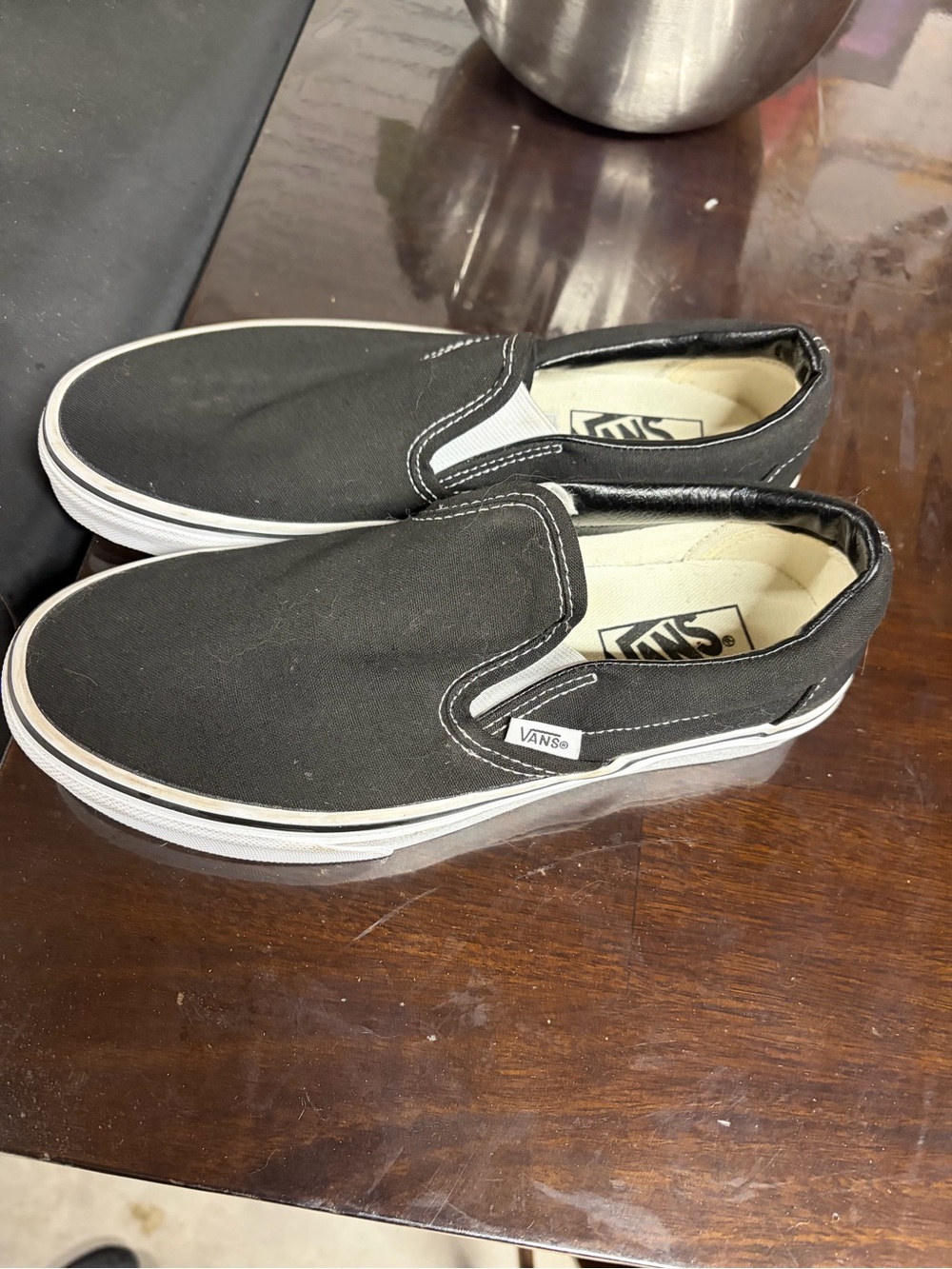 Vans Black and White Slip-On Canvas Sneakers